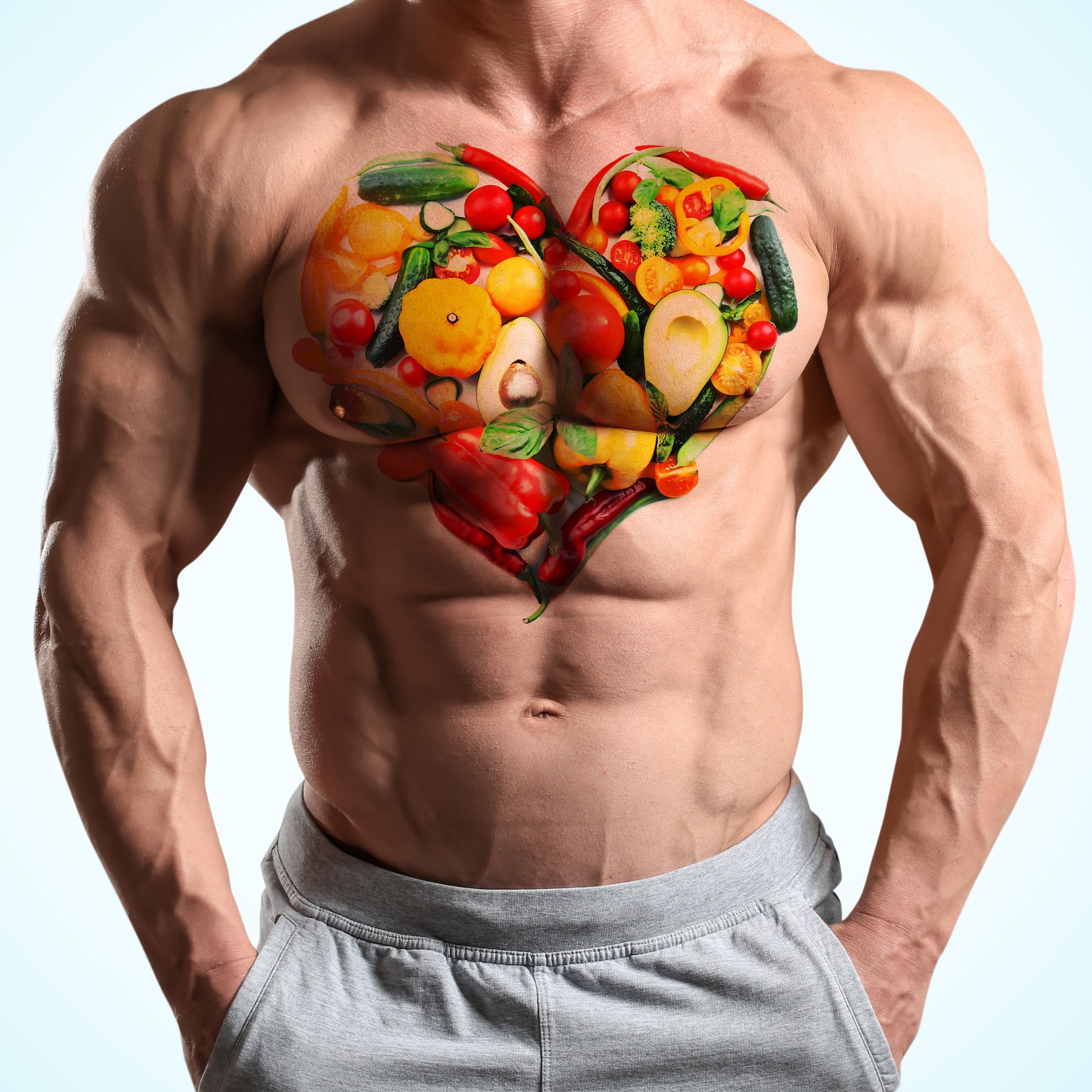 Muscular bodybuilder on grey background